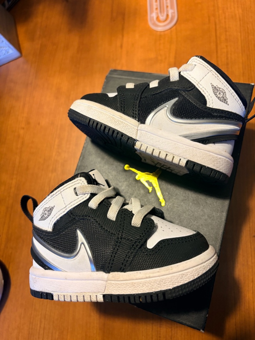 Jordan Toddler Black and White High-Top Sneakers with Silver Swoosh